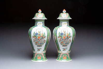 A pair of famille verte-style 'Lotus Pond and Flower Basket' vases and covers, Samson, Paris, 19th C.