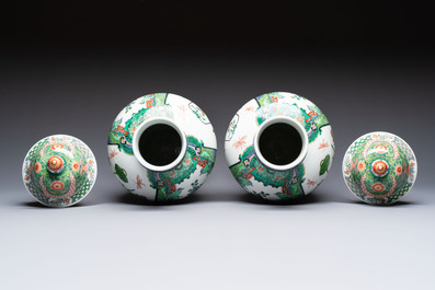 A pair of famille verte-style 'Lotus Pond and Flower Basket' vases and covers, Samson, Paris, 19th C.