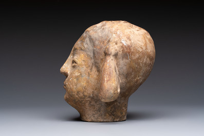 Two Chinese polychrome pottery figures and a female head, Tang