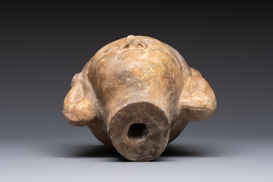 Two Chinese polychrome pottery figures and a female head, Tang