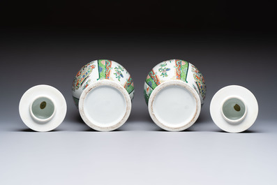 A pair of famille verte-style 'Lotus Pond and Flower Basket' vases and covers, Samson, Paris, 19th C.