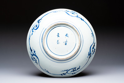 A large Japanese Arita blue and white 'Tiger' dish, Fuuki Chousun 富貴長春 mark, late Edo to early Meiji, 18/19th C.