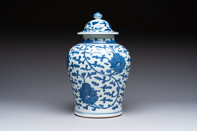 A Chinese blue and white vase and cover with floral design, Kangxi