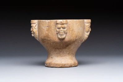A rare Italian marble &lsquo;Poison Mortar&rsquo; with skulls and masks, 17th C.