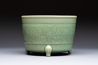 A large Chinese Longquan celadon tripod censer with floral design, Ming