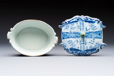 A blue and white Dutch Delft butter tub with green-glazed accents, 18th C.