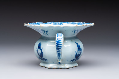 A blue and white Dutch Delft spittoon, 18th C.