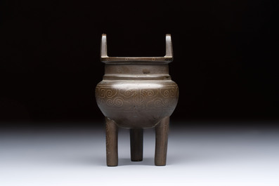 A Chinese silver-inlaid bronze tripod censer with clouds design, 19th C.