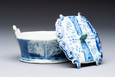 A blue and white Dutch Delft butter tub with green-glazed accents, 18th C.