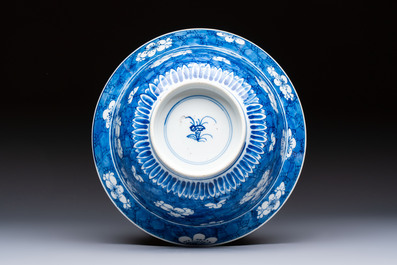 A Chinese blue and white 'Prunus on Cracked Ice' bowl, lingzhi mark, Kangxi