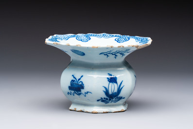 A blue and white Dutch Delft spittoon, 18th C.