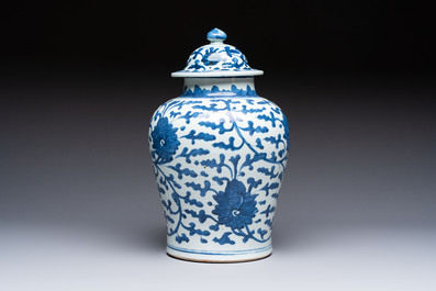 A Chinese blue and white vase and cover with floral design, Kangxi