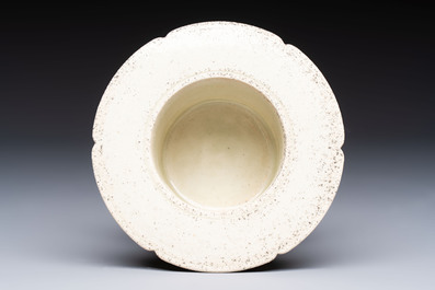 A Chinese qingbai censer with masks in relief, 20th C