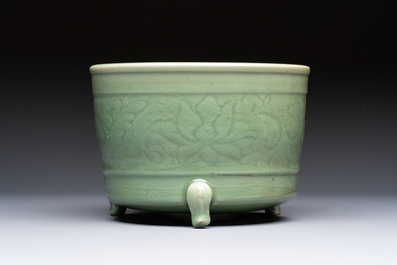 A large Chinese Longquan celadon tripod censer with floral design, Ming