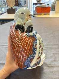 Two Chinese famille rose Milefo Buddhas and a famille rose black-ground covered vase, Zhu Mao Ji 朱茂記造 and Kangxi marks, 19/20th C.