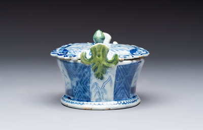 A blue and white Dutch Delft butter tub with green-glazed accents, 18th C.
