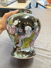Two Chinese famille rose Milefo Buddhas and a famille rose black-ground covered vase, Zhu Mao Ji 朱茂記造 and Kangxi marks, 19/20th C.