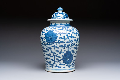 A Chinese blue and white vase and cover with floral design, Kangxi