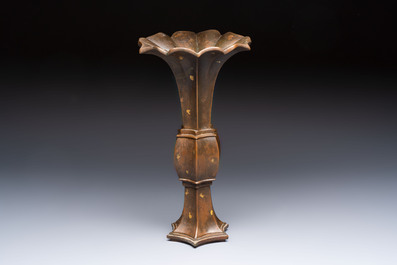 A Chinese gold-splashed bronze 'Gu' vase, Xuande mark, 17/18th C.