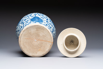 A Chinese blue and white vase and cover with floral design, Kangxi