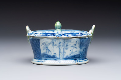 A blue and white Dutch Delft butter tub with green-glazed accents, 18th C.