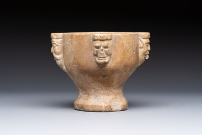 A rare Italian marble &lsquo;Poison Mortar&rsquo; with skulls and masks, 17th C.