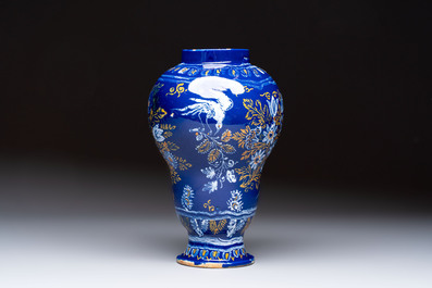 A Nevers blue-ground baluster vase with birds among flowering branches, France, 2nd half 17th C.