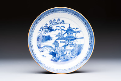 A set of 12 Chinese blue and white 'Landscape' bowls and saucers, Qianlong/Jiaqing