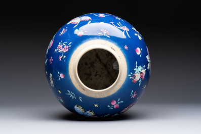 A pair of Chinese gilt-decorated powder-blue-ground covered jars and a famille rose powder-blue-ground jar, 18/19th C.