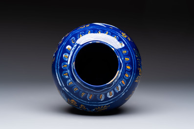 A Nevers blue-ground baluster vase with birds among flowering branches, France, 2nd half 17th C.