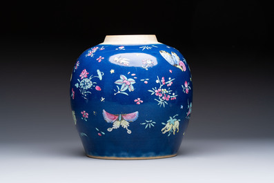 A pair of Chinese gilt-decorated powder-blue-ground covered jars and a famille rose powder-blue-ground jar, 18/19th C.