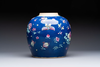 A pair of Chinese gilt-decorated powder-blue-ground covered jars and a famille rose powder-blue-ground jar, 18/19th C.