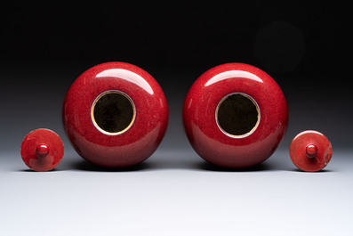 A pair of Chinese flamb&eacute;-glazed jars and covers, 19th C.