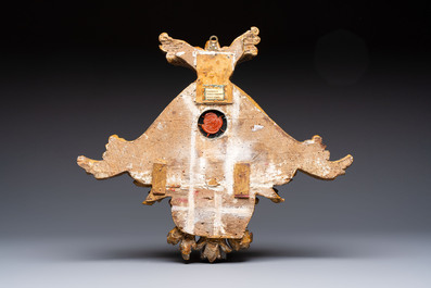 An Italian carved wood and coral- and turquoise-decorated reliquary containing a relic ex cineribus of Saint Teresa of Jesus, early 20th C.