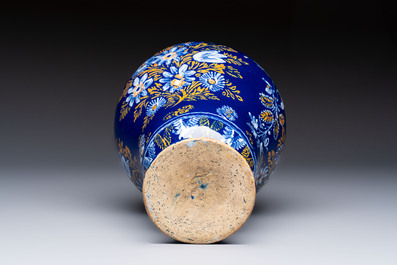 A Nevers blue-ground baluster vase with birds among flowering branches, France, 2nd half 17th C.