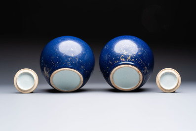 A pair of Chinese gilt-decorated powder-blue-ground covered jars and a famille rose powder-blue-ground jar, 18/19th C.