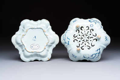 A fine blue and white Dutch Delft strawberry strainer and stand, 18th C.