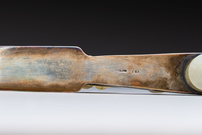 A Chinese mounted magnifying glass with a jade handle and a sterling silver letter opener with a jade handle, 19th C.