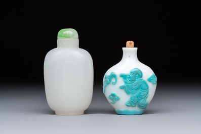 A Chinese turquoise-overlay white glass 'Fushou 福壽' snuff bottle and a glass imitating jade snuff bottle, Qianlong mark, 19th C.