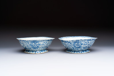 Four Chinese blue, white and famille rose tazzas and a covered spice bowl with bats design, 19th C.