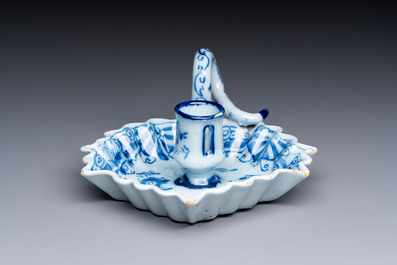 A blue and white Dutch Delft leaf-shaped chamberstick, 18th C.