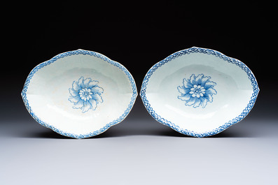 Four Chinese blue, white and famille rose tazzas and a covered spice bowl with bats design, 19th C.