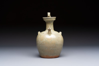 A fine Chinese Yueyao green-glazed chicken-head ewer with dragon-form handle, Southern Dynasties