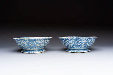 Four Chinese blue, white and famille rose tazzas and a covered spice bowl with bats design, 19th C.