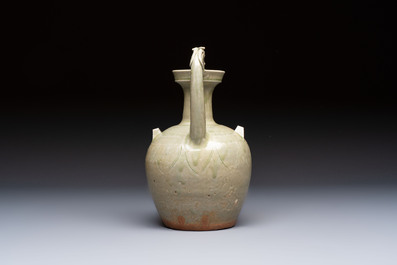 A fine Chinese Yueyao green-glazed chicken-head ewer with dragon-form handle, Southern Dynasties