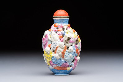 A Chinese famille rose moulded, reticulated and double-walled '18 Luohan' snuff bottle, Qianlong mark, 19th C.