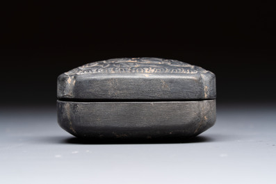 A Chinese carved black pottery 'Mythical Animal' box and cover, Yuan/Ming