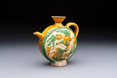 A rare Chinese sancai 'Phoenix' ewer with a wooden box, Liao