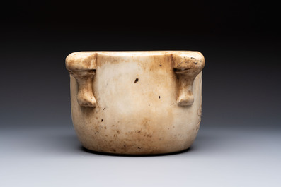 A large Italian carved marble 'Memento Mori' apothecary mortar, 17th C.