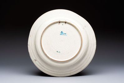 A rare polychrome Dutch Delft 'Nieuw Delft' dish in Kashan style, ca. 1900